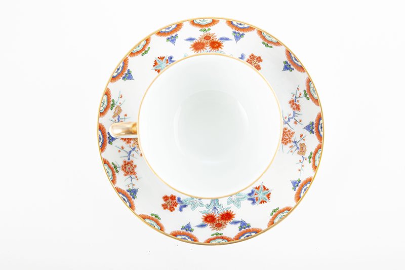 Colored plum and chrysanthemum pattern [tea bowl and plate]